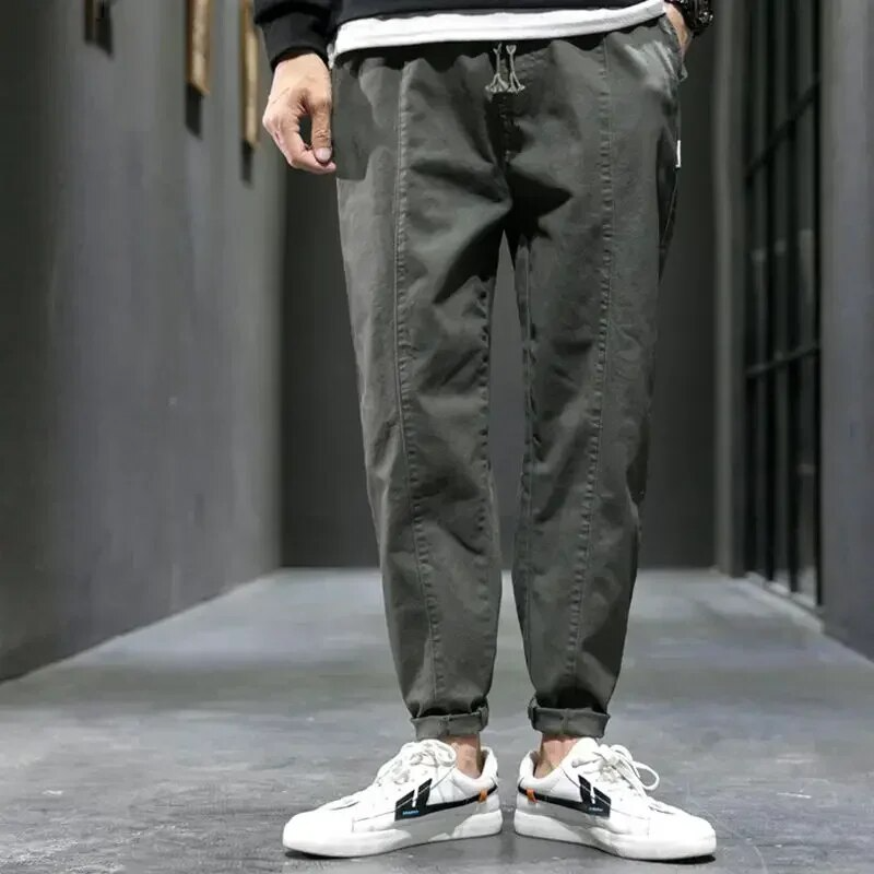 Pantaloni da corsa aderenti in cotone misto per uomo