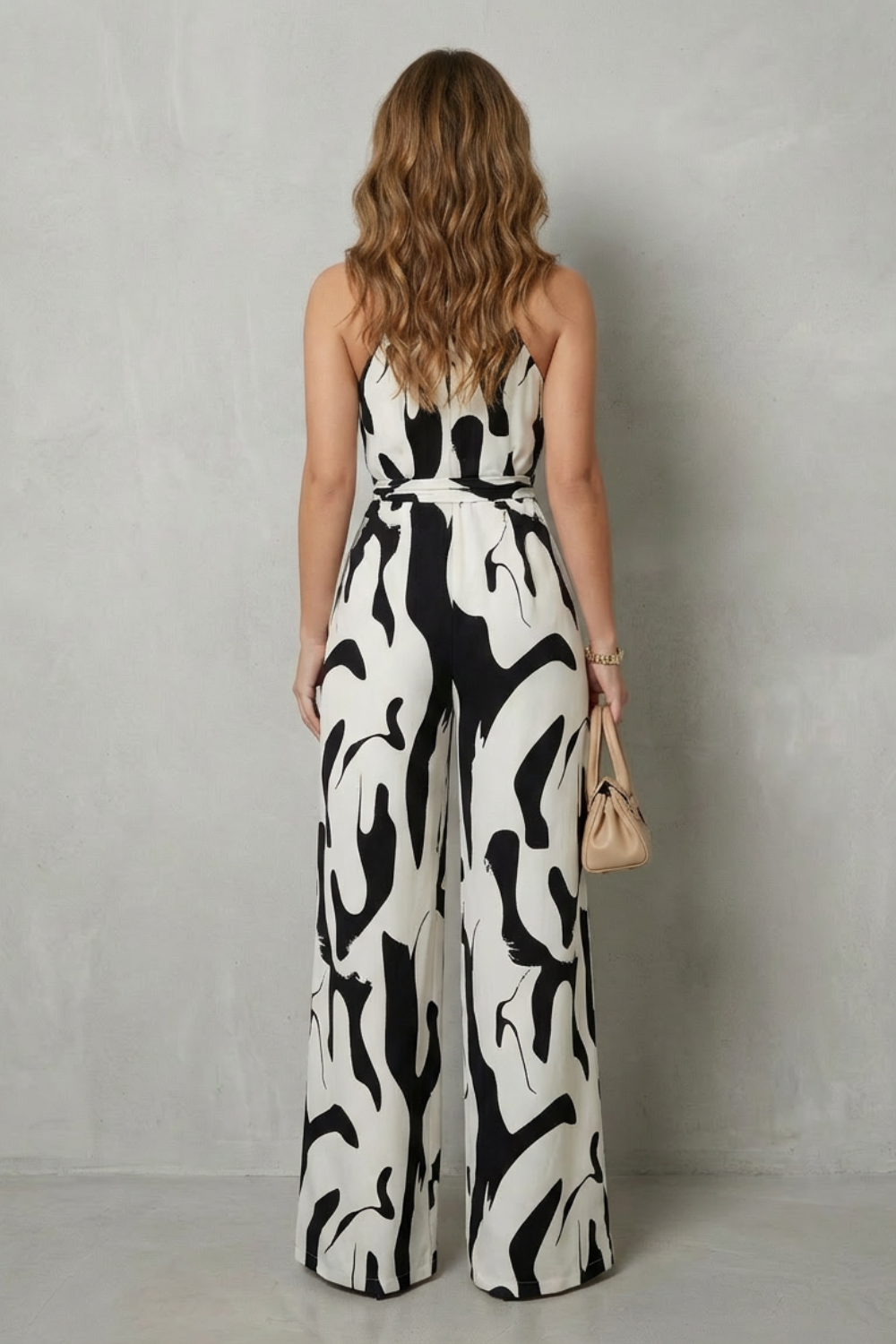Marchmel | Femme Combinaison à imprimé abstrait avec col halter – Pantalon large