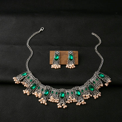 Boucles d'oreilles vintage en émeraude avec pendentif