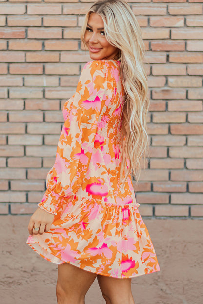 Mini robe orange à volants manches lanternes smockées style évasé élégant pour femmes